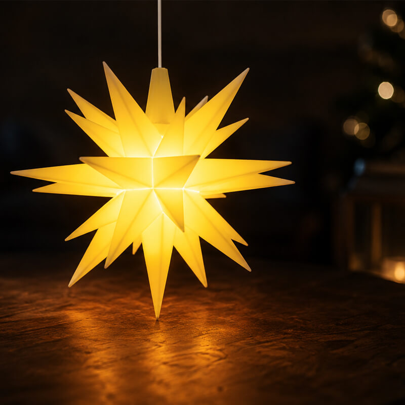 Herrnhut Ministar yellow lit up on wooden table