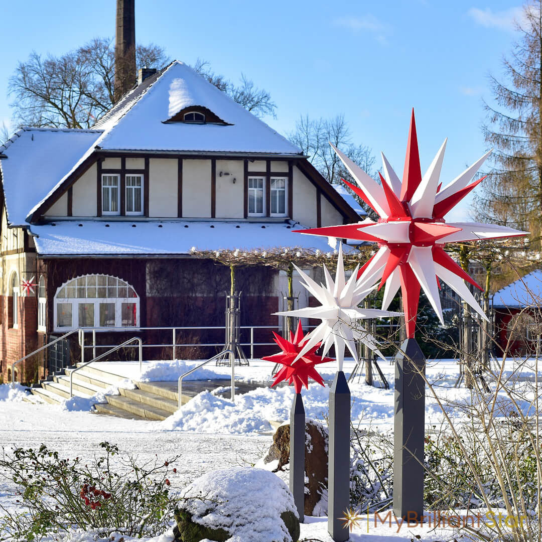 Garden decorated with Original Herrnhut plastic star, white / red, ~ 130 cm / 51 inch ø