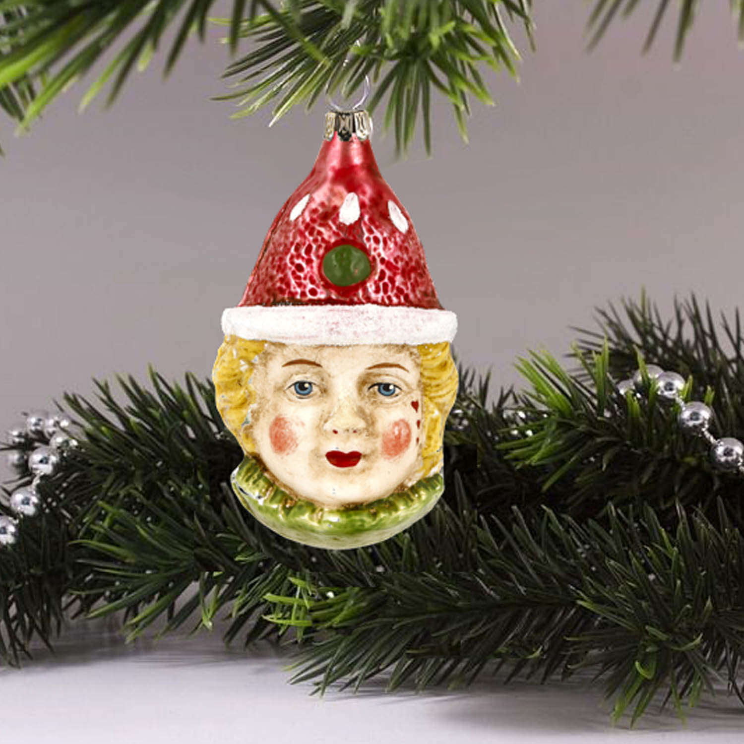 MAROLIN® - Glass ornament "Clown with red hat" serving as Christmas deocration.