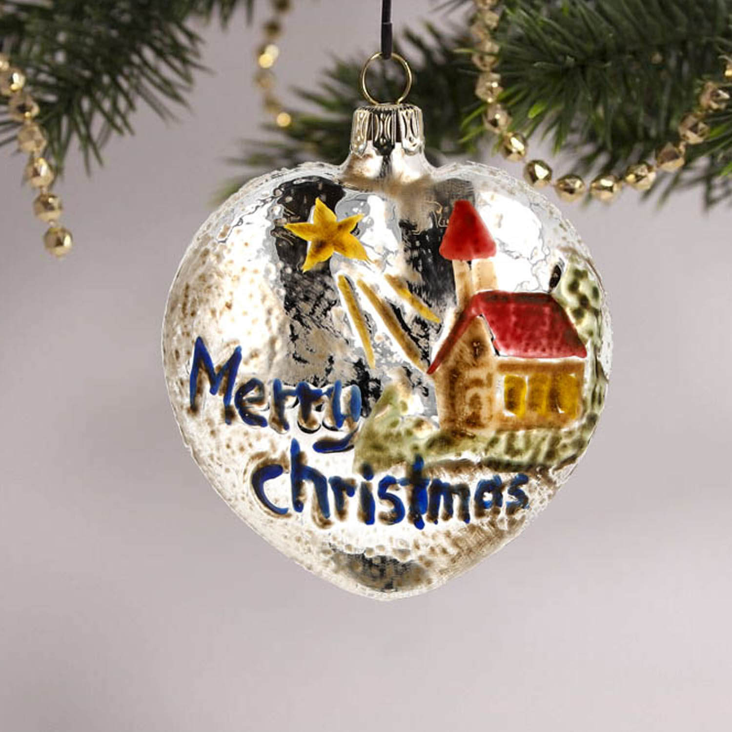 MAROLIN® - Glass ornament "Heart with church and stars red roof" hanging in Christmas tree
