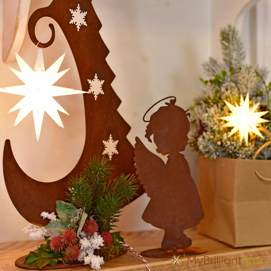 a starbow decorated with the Original Herrnhut plastic MINISTAR, white, ~ 8 cm / 3 inch ø - LED bulb