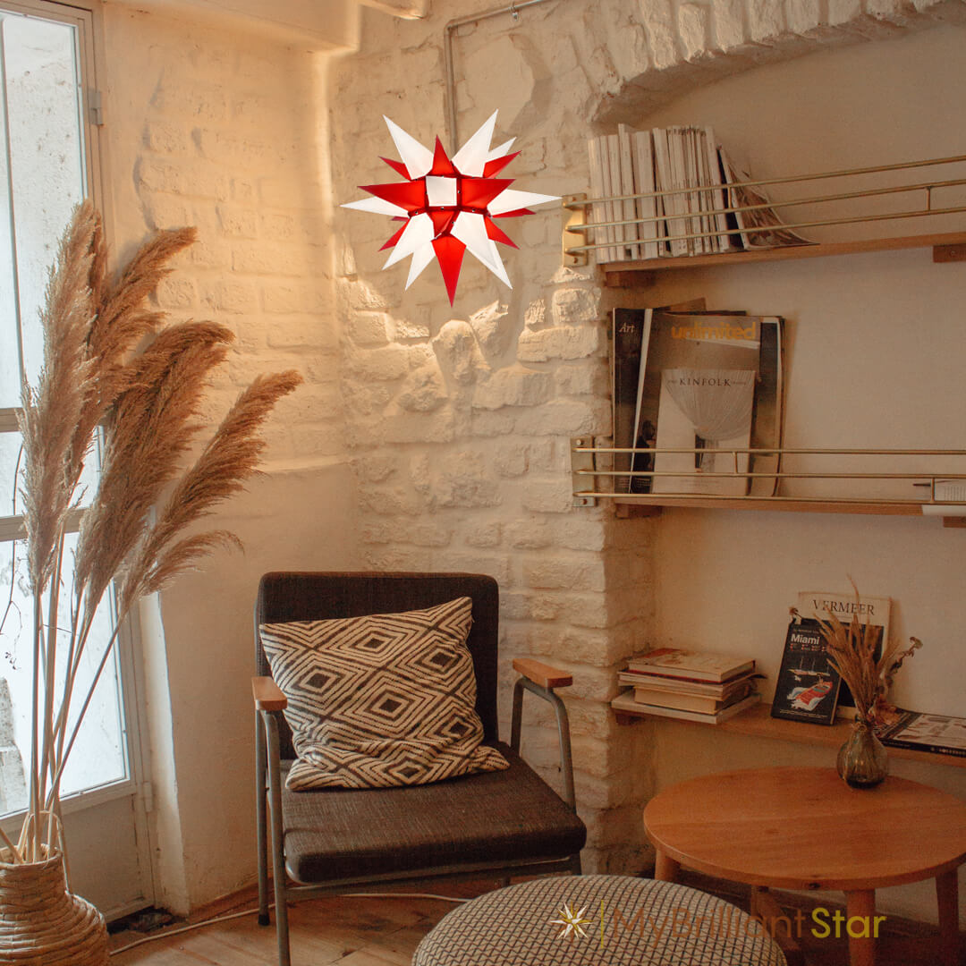 Original Herrnhut paper star, white / red, ~ 40 cm / 16 inch ø hanging in living room