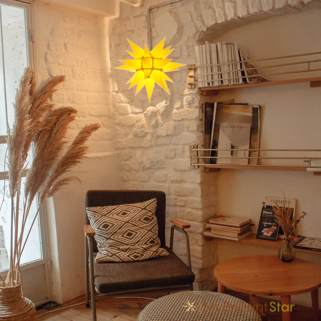 Original Herrnhut paper star, yellow, ~ 40 cm / 16 inch ø in living room