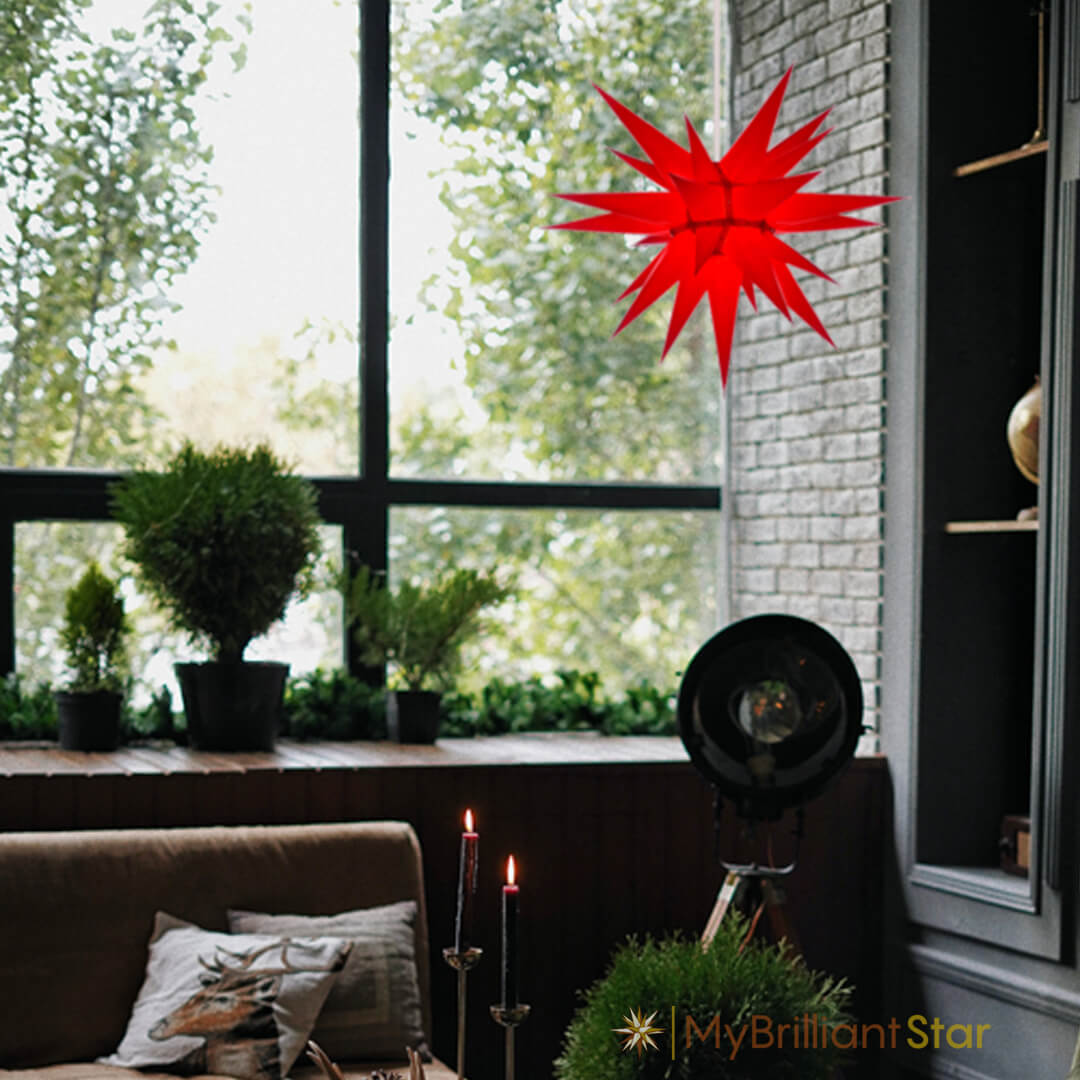 Original Herrnhut paper star, red, ~ 60 cm / 24 inch ø hanging in window