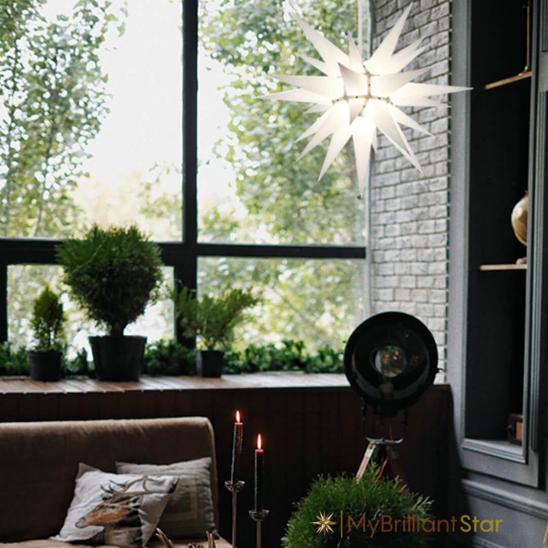 White Herrnhuter star hanging in a window