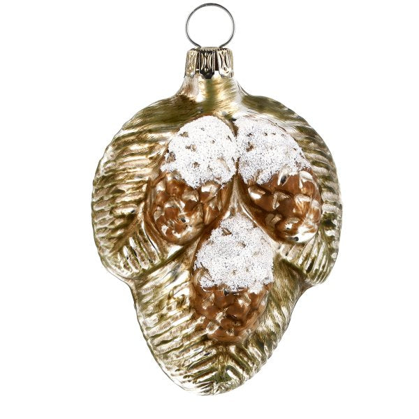 Handblown glass ornament featuring twigs and three small pine cones, showcasing intricate details and a vintage patinated finish.