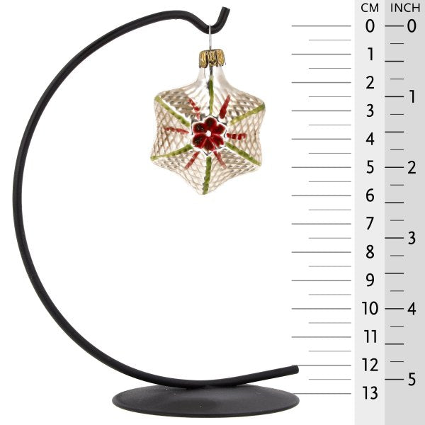 Charming glass star ornament with a rich red colour, adding festive elegance to holiday decor