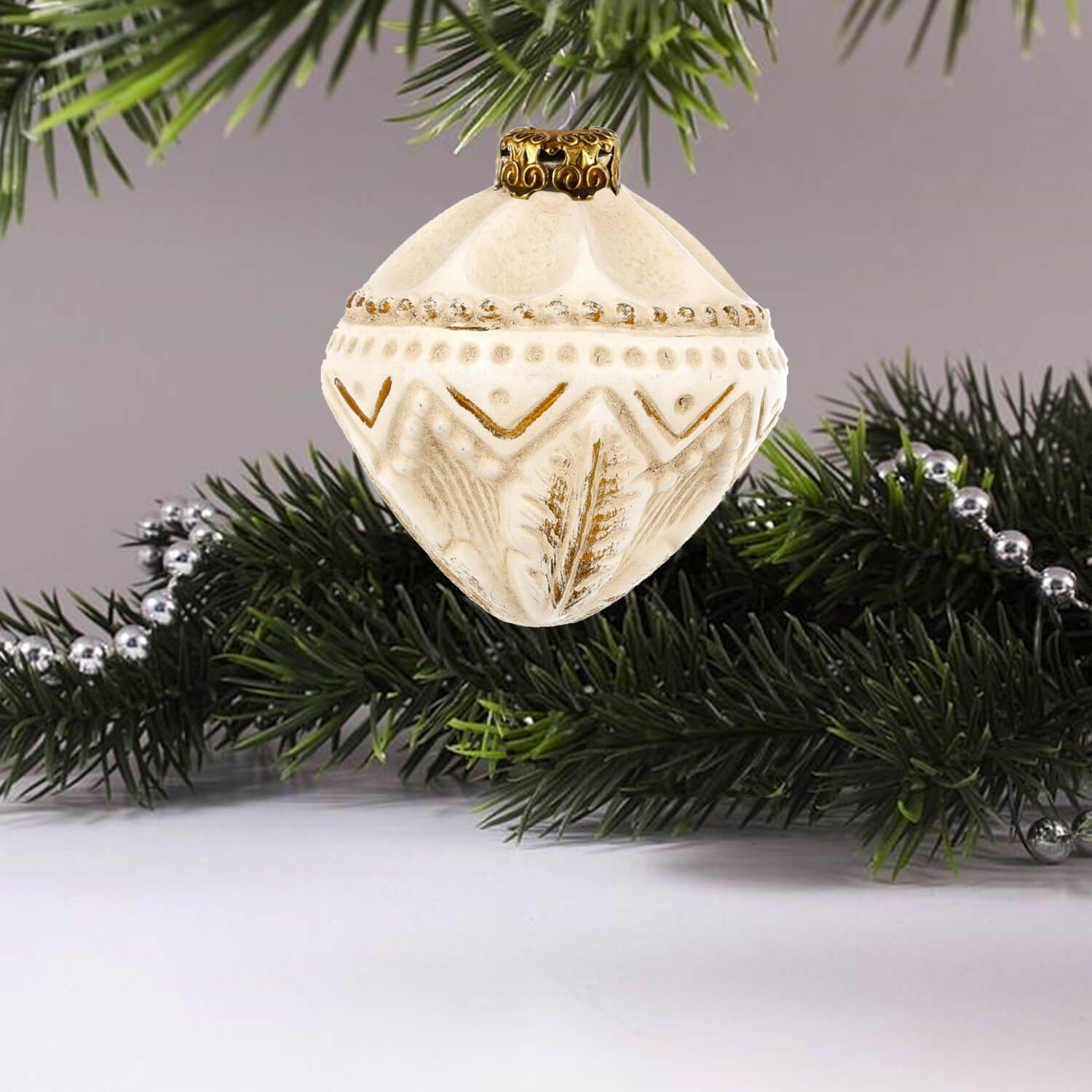 MAROLIN® - Paper-mâché Ornament "Gyroscope" hanging on a christmas tree