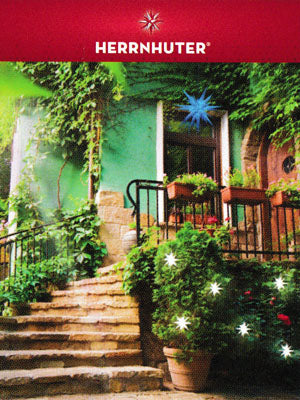 Summer stairway decorated with Herrnhuter Stars