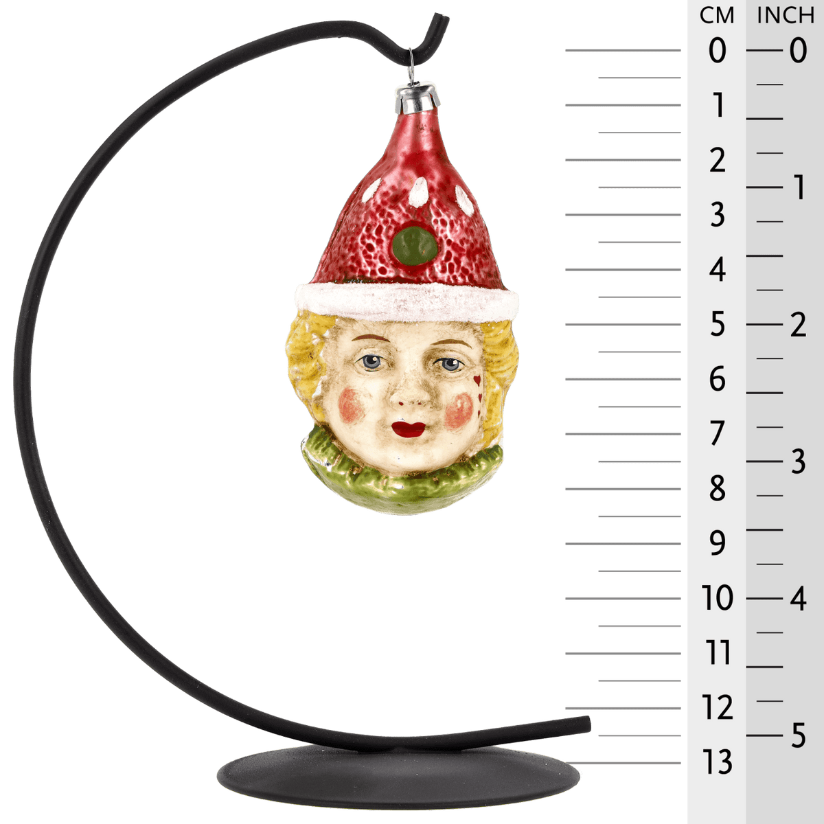 MAROLIN® - Glass ornament &quot;Clown with red hat&quot; displayed on a Herrnhut star bow