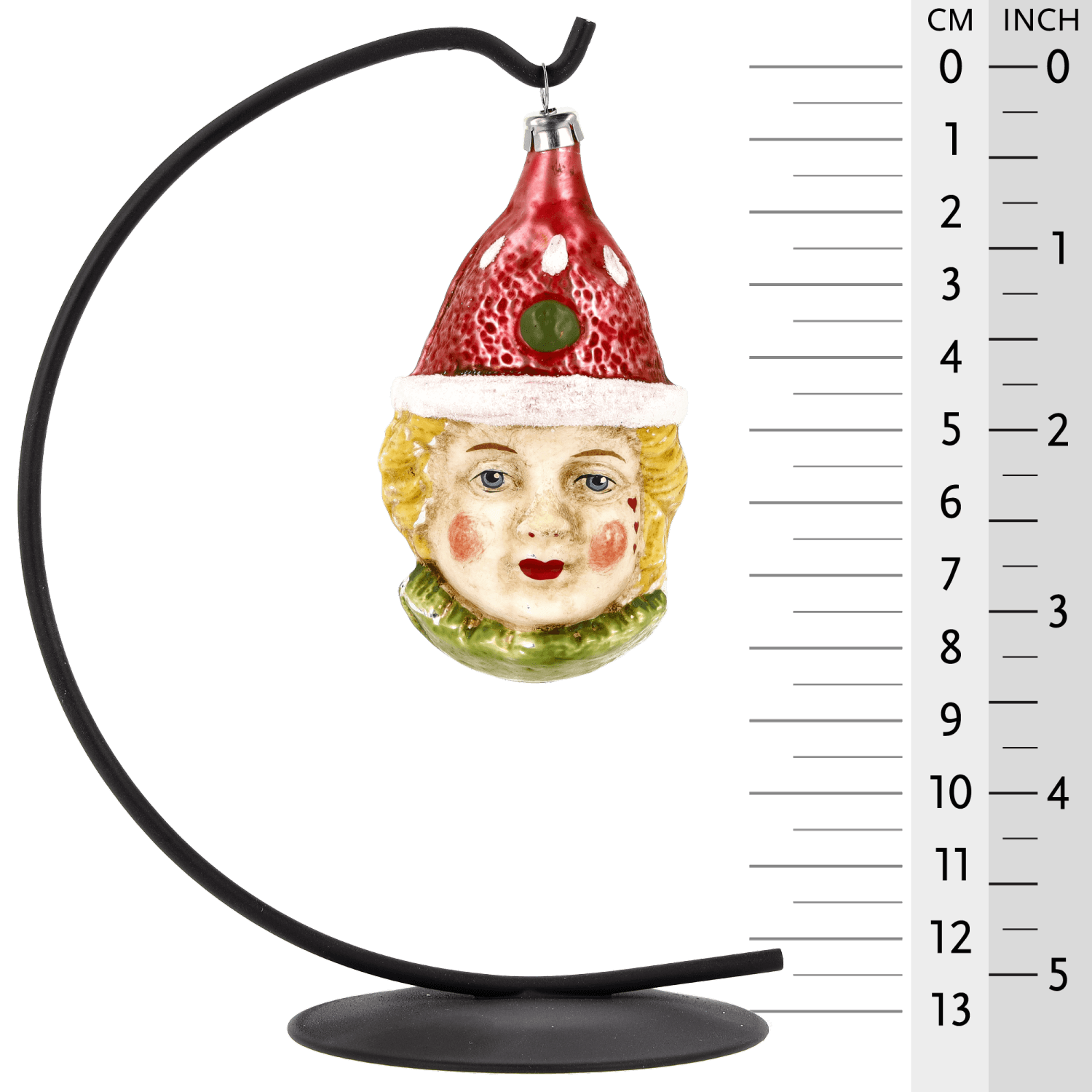 MAROLIN® - Glass ornament "Clown with red hat" displayed on a Herrnhut star bow