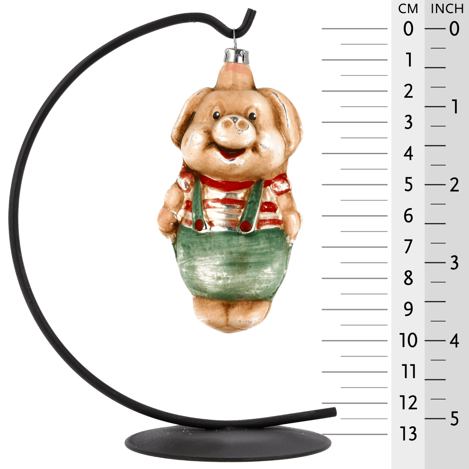 MAROLIN® - Glass ornament "Pig with pants" displayed on a 13 inch Herrnhut Star bow