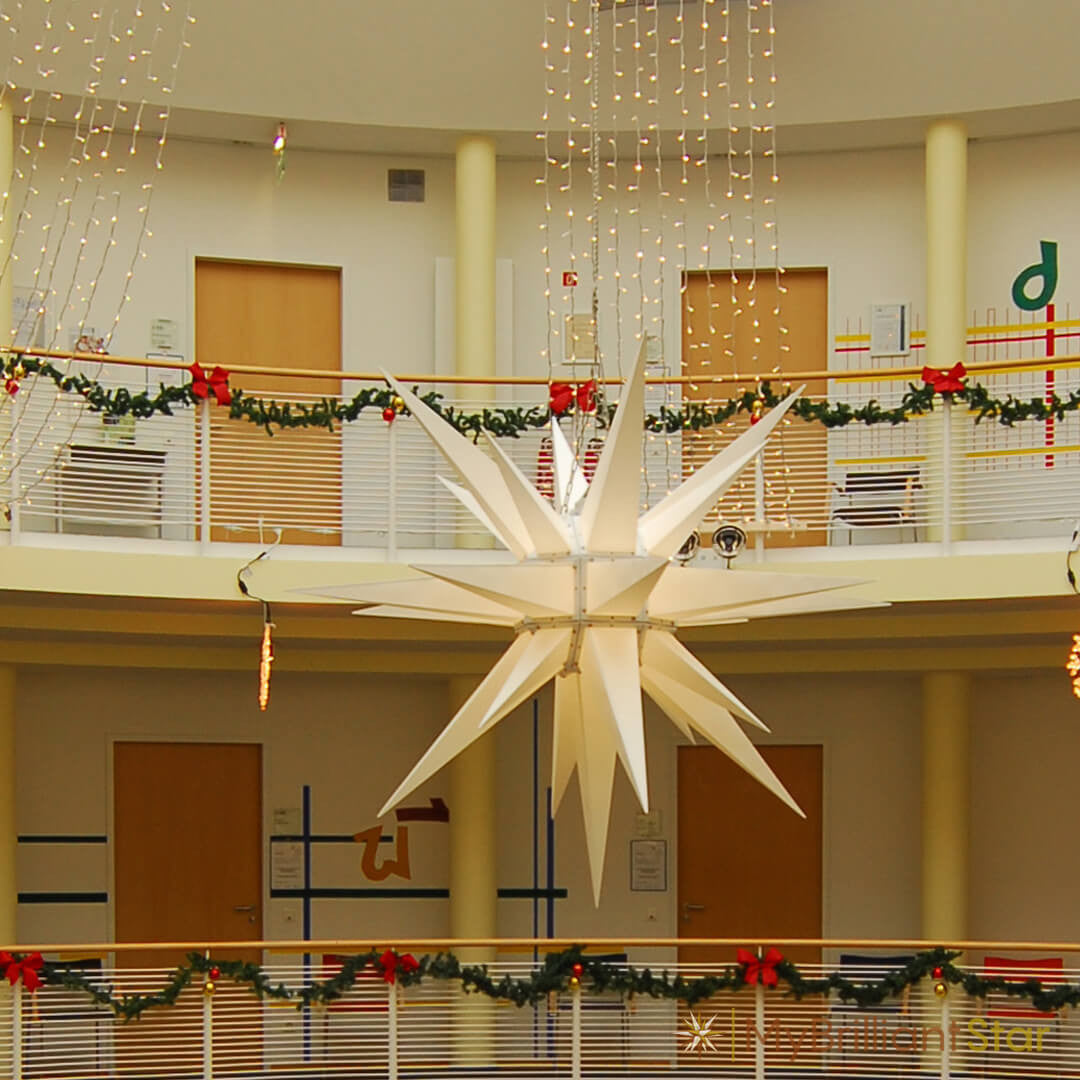 home decorated with Original Herrnhut plastic star, white, ~ 130 cm / 51 inch ø