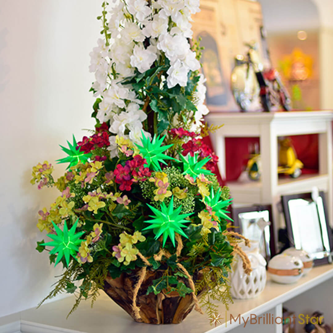 beautiful flowers arranged with 6  green Original Herrnhut plastic stars, ~ 13 cm / 5 inch ø
