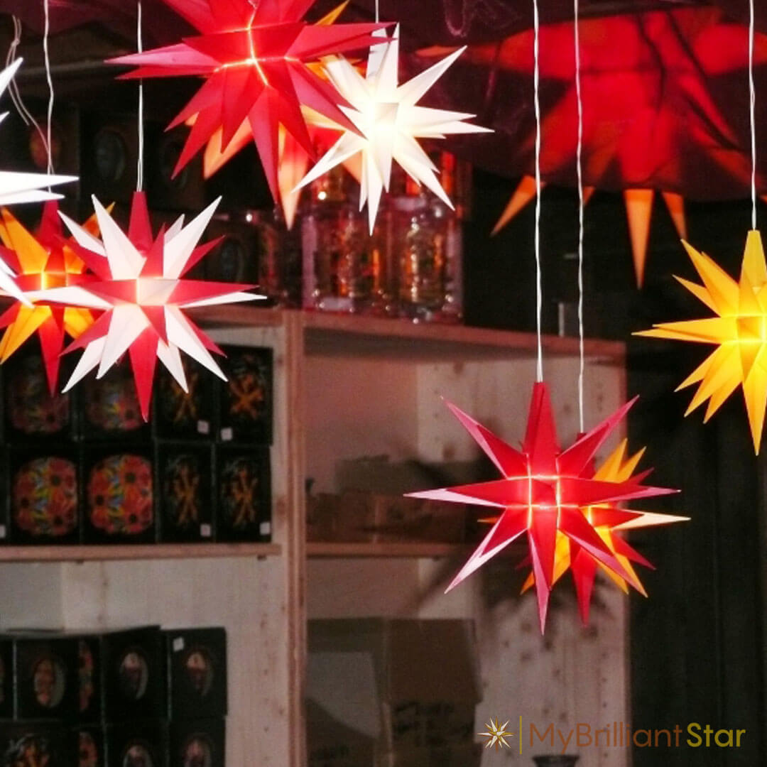 Original Herrnhut plastic star, red, ~ 13 cm / 5 inch ø red white and yellow stars hanging down the sealing