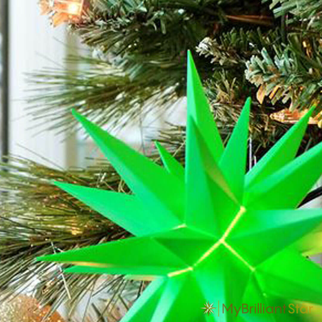 Original Herrnhut plastic star, green, ~ 13 cm / 5 inch ø shining bright on Chrsitmas tree