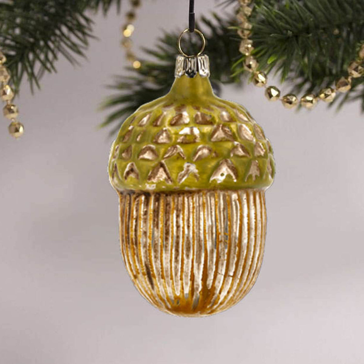 MAROLIN® - Glass ornament &quot;Acorn&quot; on decorated Christmas tree