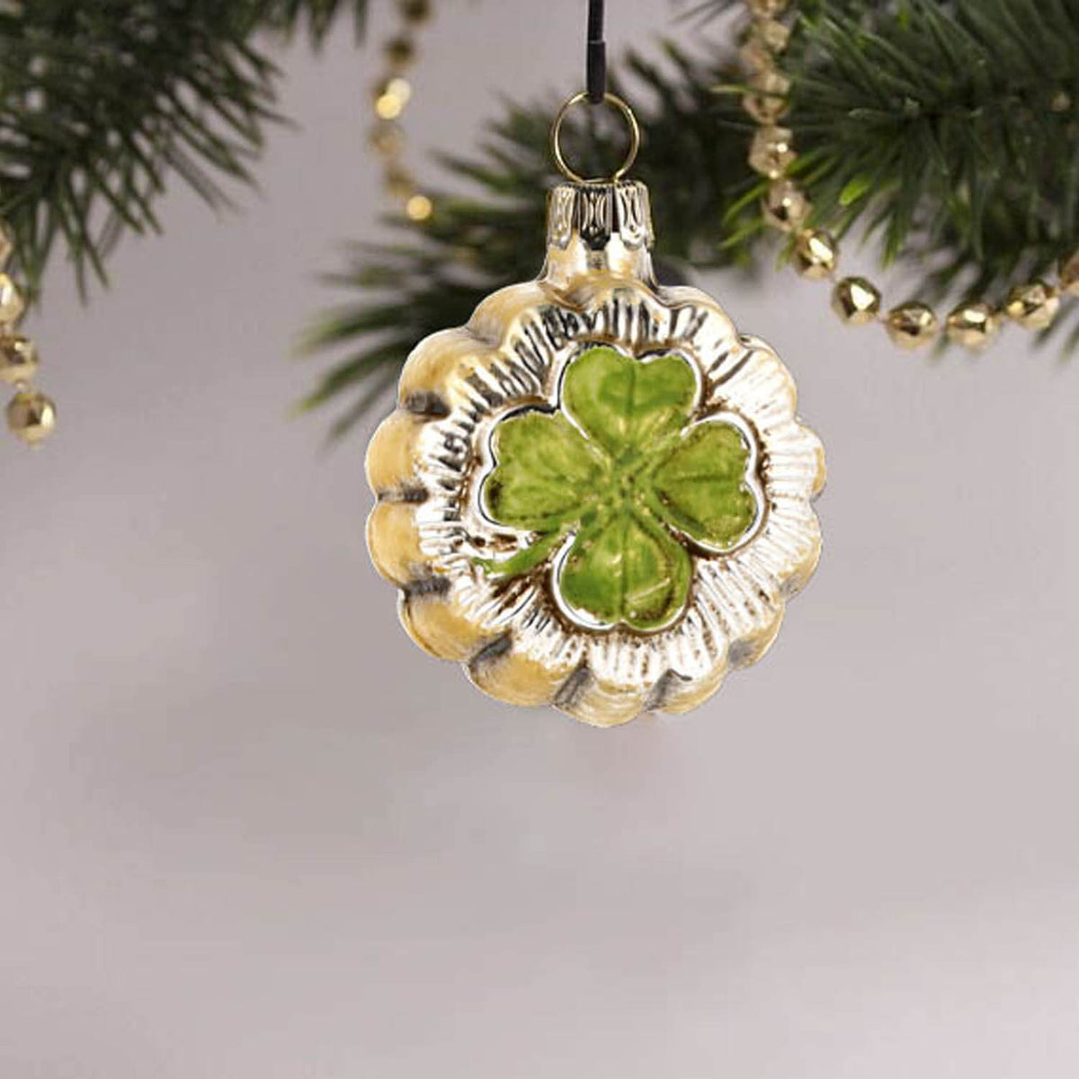 MAROLIN® - Miniature glass ornament &quot;cloverleaf&quot; hanging on a decorated Christmas tree