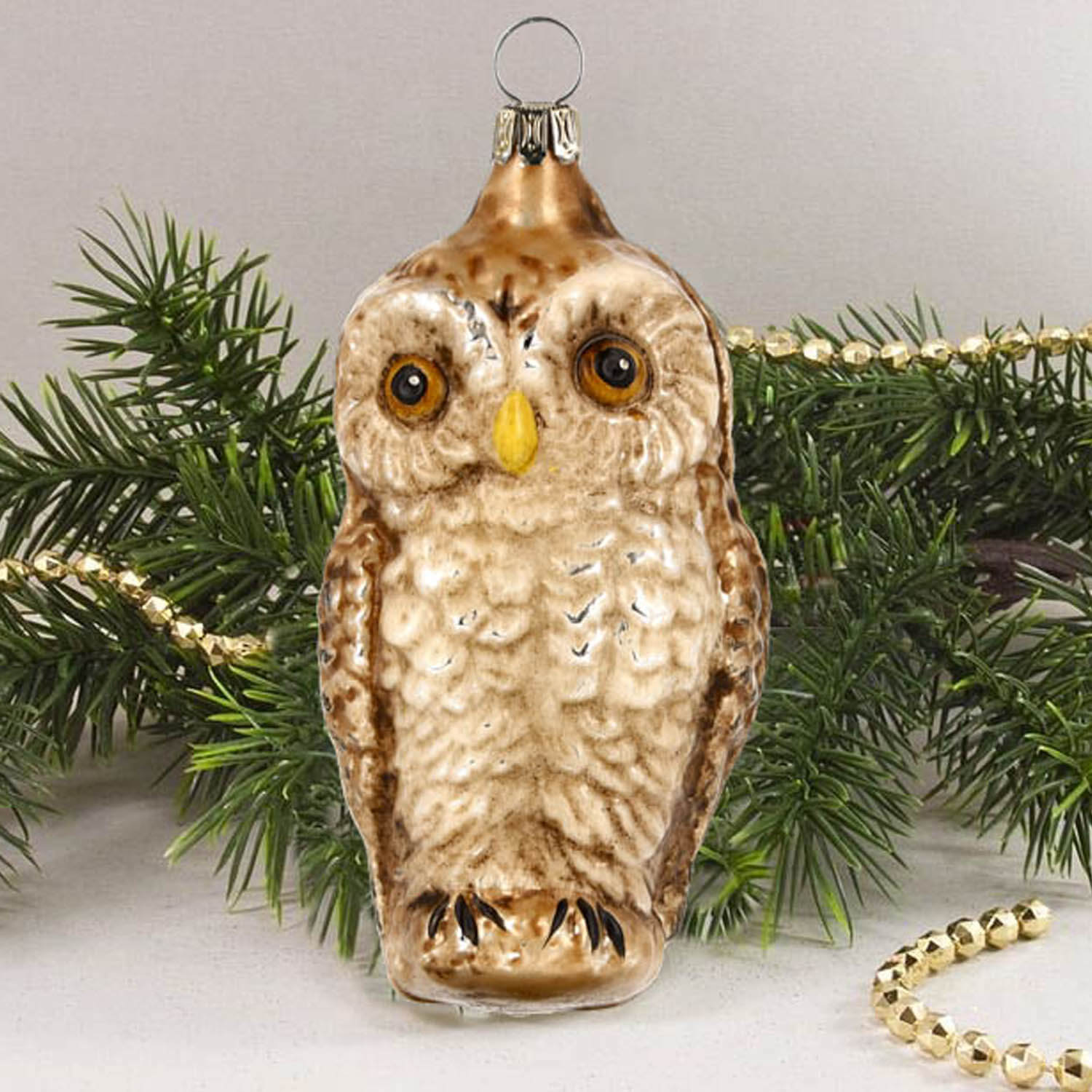 MAROLIN® - Glass ornament "Owl" in front of Christmas tree