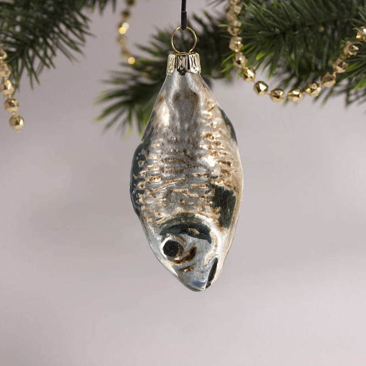 MAROLIN® - Miniature glass ornament &quot;Carp&quot; hanging on decorated Christmas tree
