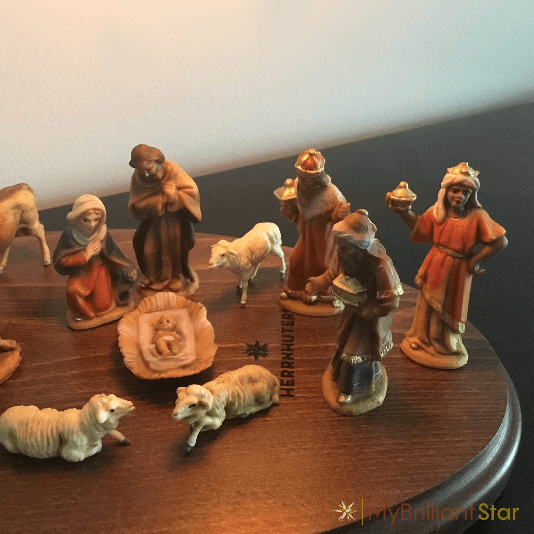 Original MAROLIN® - nativity set, 12 pcs. - 7 cm / 2.75 inch figures standing on walnut  star bow from Herrnhut.