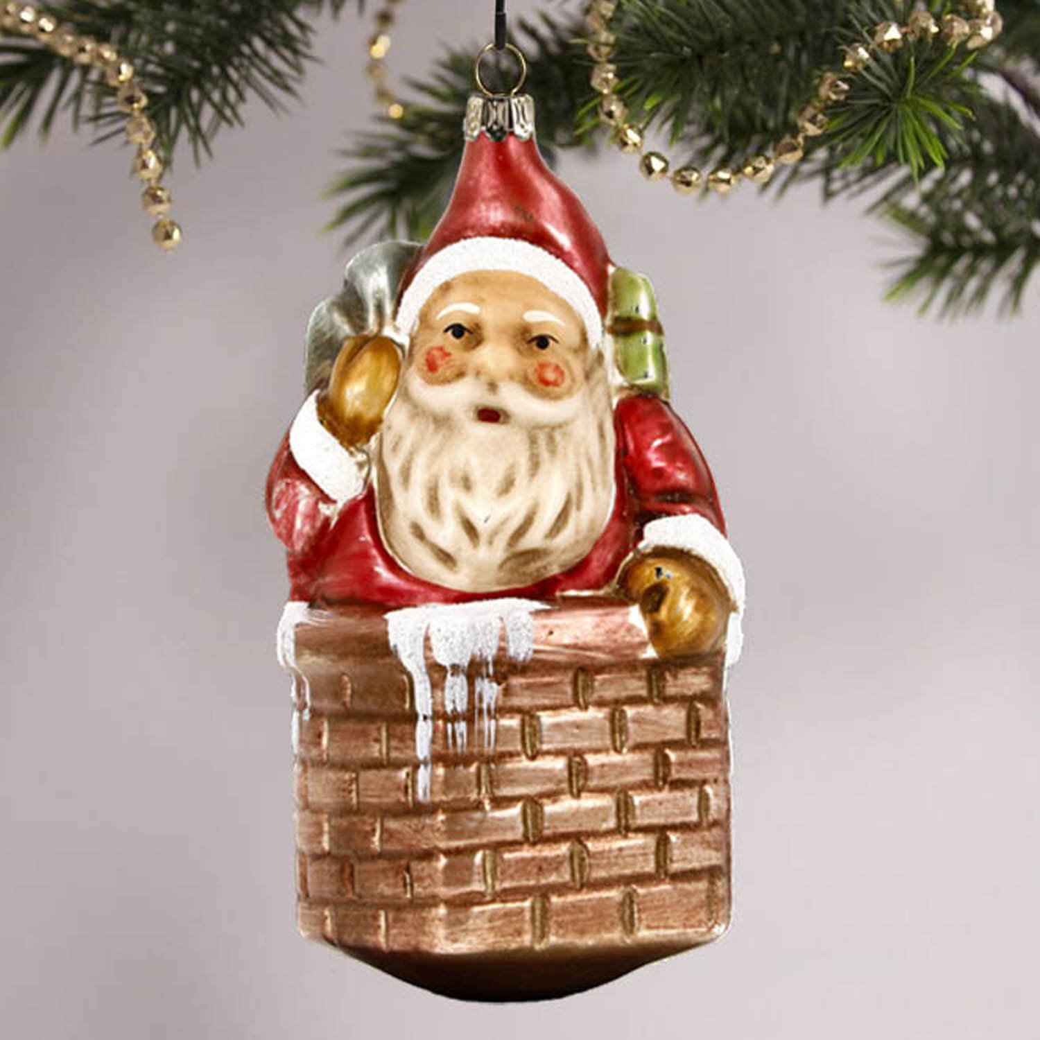 MAROLIN® - Glass ornament "Nicholas with sack in chimney"