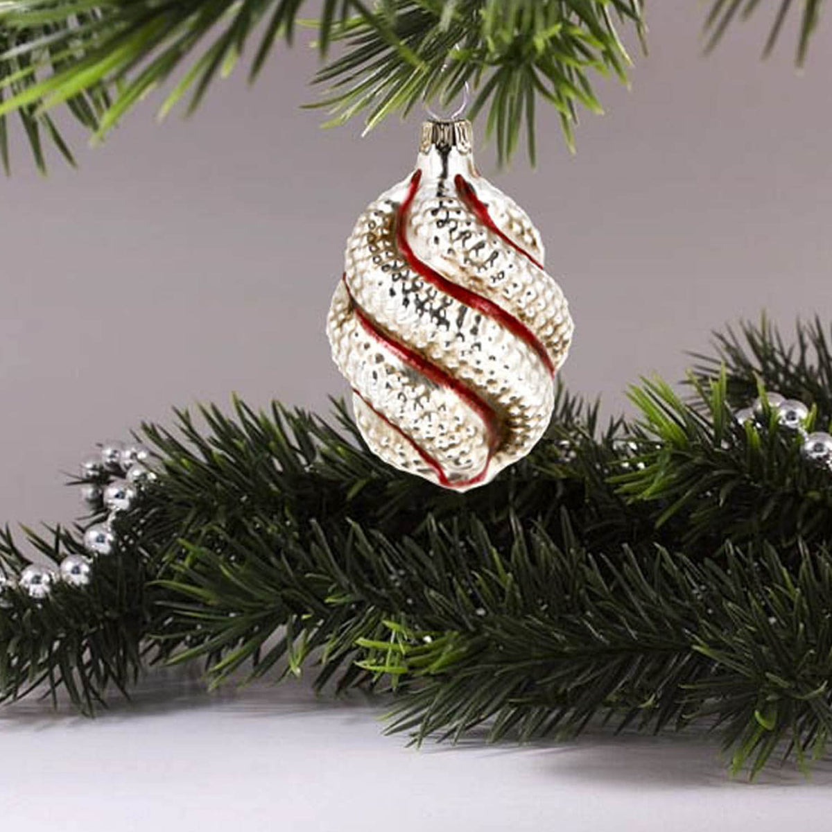 MAROLIN® - Glass ornament &quot;Oval with red stripes&quot; on Christmas tree