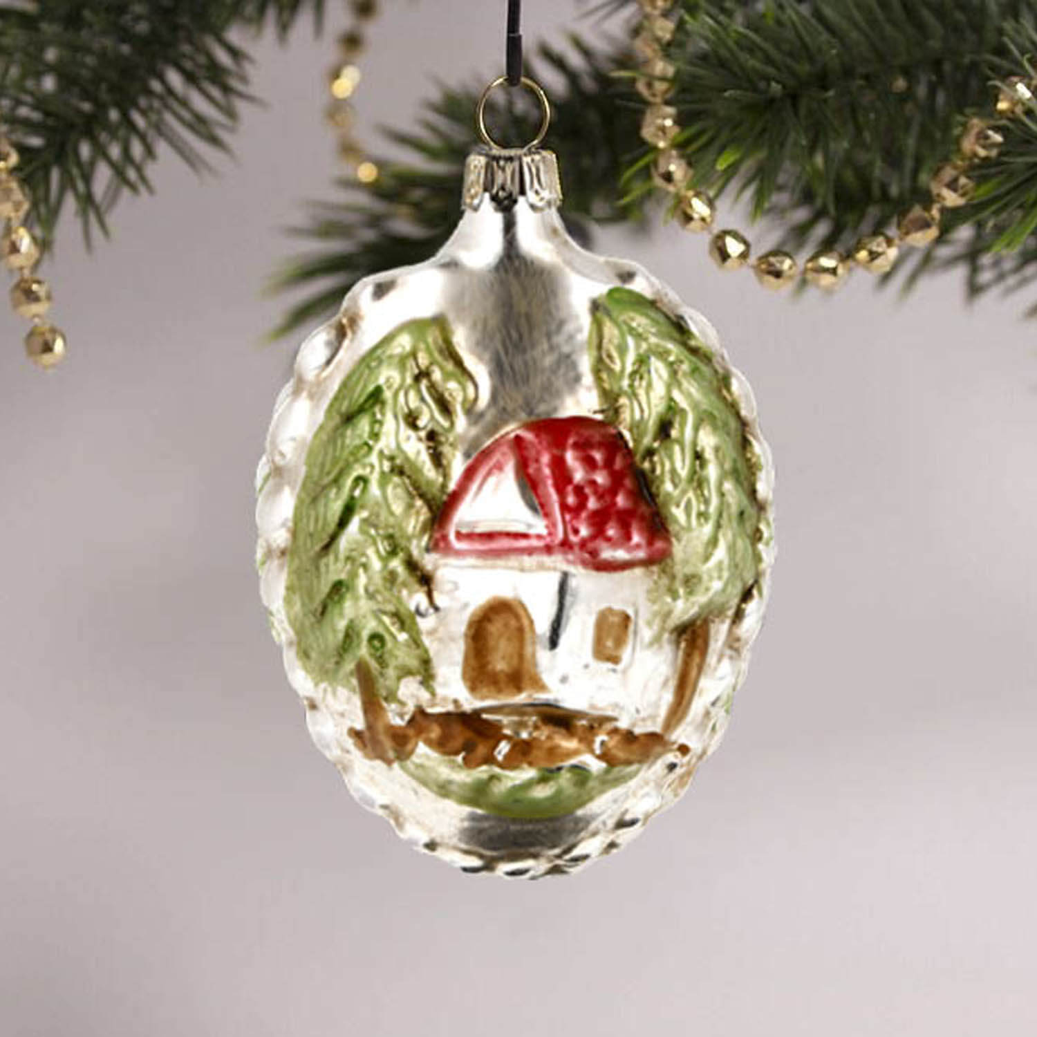 MAROLIN® - Glass ornament "Little Red Riding Hood" hanging in decorated Christmas tree