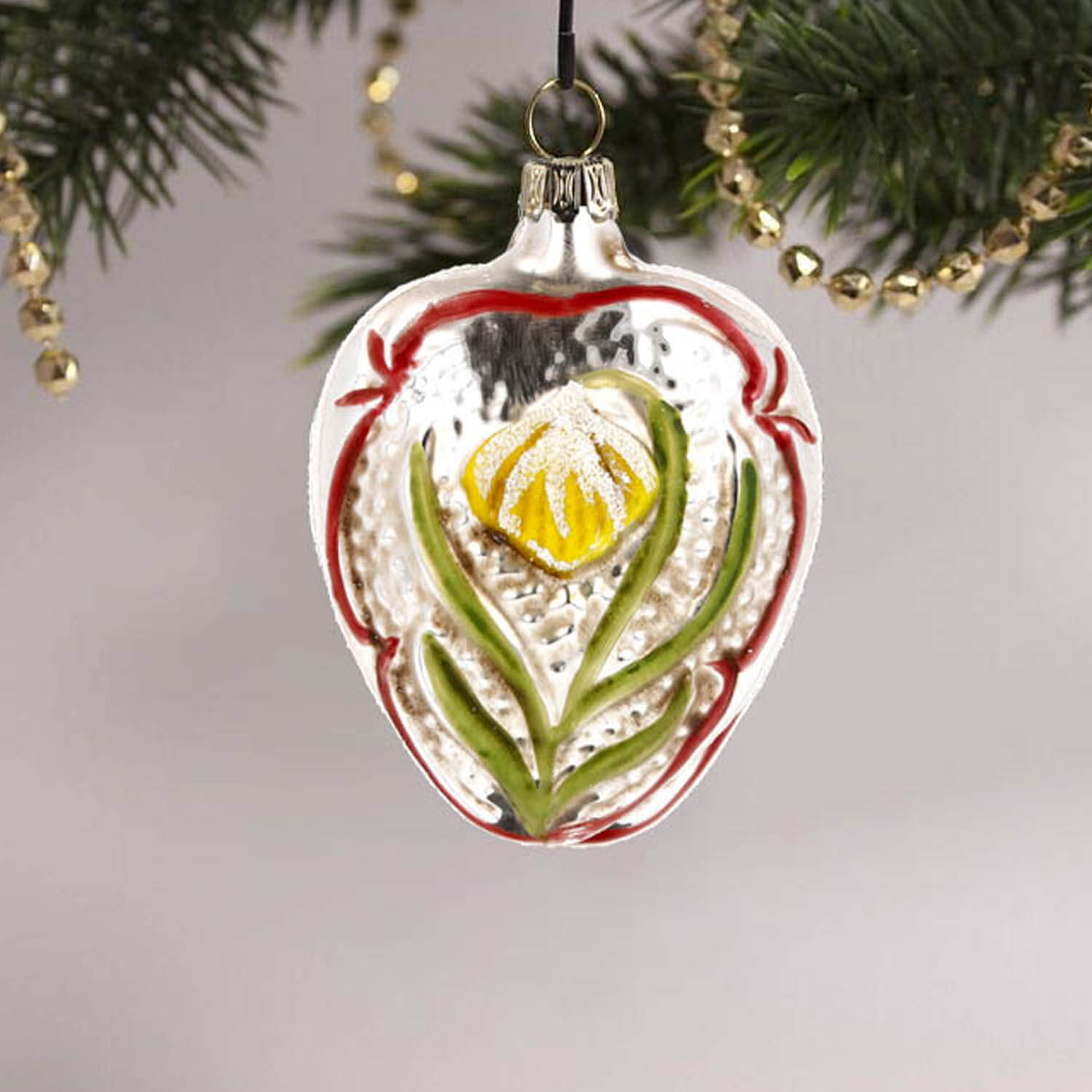 MAROLIN® - Glass ornament "Heart with snowdrop" from the front hanging on Christmas tree