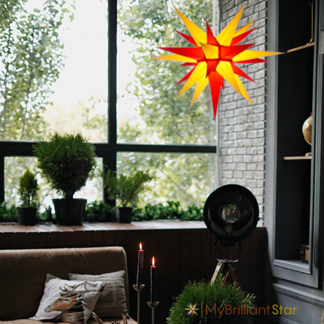 Red and Yellow Herrnhuter star hanging in a Window