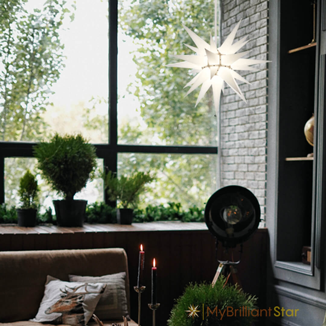 Original Herrnhut paper star, white, ~ 60 cm / 24 inch ø hanging in window